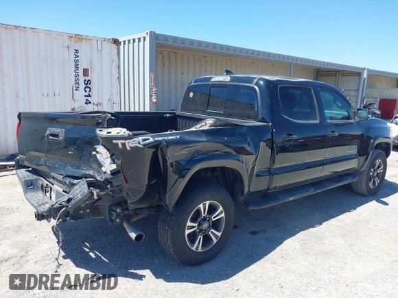 2018 Toyota Tacoma SR5 with VIN 3TMBZ5DN1JM014540, listed as a IAAI auction lot 42505324 with 112,990 mi miles and . Bid and sale history available at DreamBid. Image 4.
