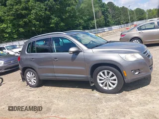 2011 Volkswagen Tiguan SEL z VIN WVGBV7AX5BW512203, wystawiony jako IAAI lot #42273838 z przebiegiem 157 072 mil mil oraz . Historia ofert i sprzedaży dostępna na DreamBid. Obrazek 13.
