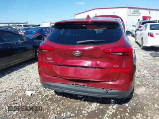 2019 Hyundai Tucson SE with VIN KM8J2CA41KU926156, listed as a IAAI auction lot 41888461 with 91,094 mi miles. Bid and sale history available at carsss.com. Image 6.