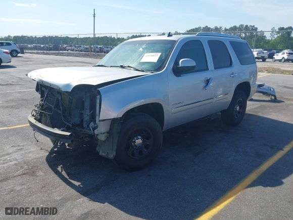 2011 GMC Yukon Denali with VIN 1GKS2EEF8BR346281, listed as a IAAI auction lot 42076037 with 264,311 mi miles. Bid and sale history available at carsss.com. Image 21.
