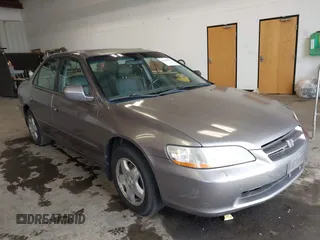 2000 Honda Accord EX z VIN 1HGCG1657YA053433, wystawiony jako IAAI lot #42322643 z przebiegiem 146 517 mil mil oraz . Historia ofert i sprzedaży dostępna na DreamBid. Obrazek 1.