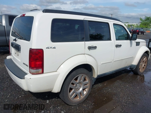 2010 Dodge Nitro Heat with VIN 1D4PU4GKXAW175021, listed as a IAAI auction lot 42274875 with 158,279 mi miles and . Bid and sale history available at DreamBid. Image 4.