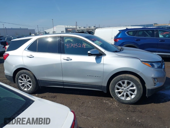 2019 Chevrolet Equinox LT with VIN 3GNAXUEV5KS670478, listed as a IAAI auction lot 41745218 with 56,996 mi miles and . Bid and sale history available at DreamBid. Image 13.