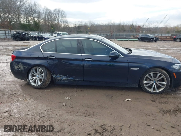 2015 BMW 5 Series 535i with VIN WBA5B1C58FG127959, listed as a IAAI auction lot 41571017 with 122,274 mi miles and . Bid and sale history available at carsss.com. Image 13.