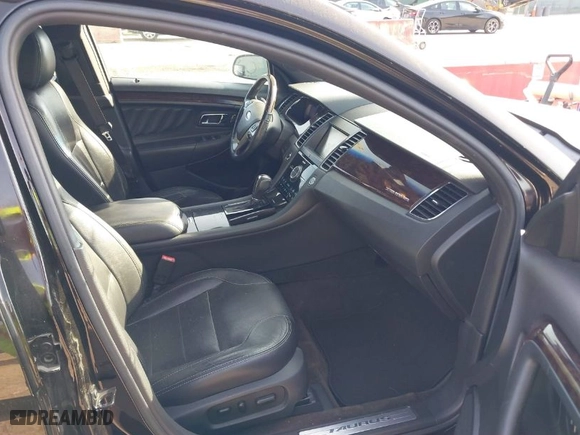 2013 Ford Taurus Limited with VIN 1FAHP2F85DG188511, listed as a IAAI auction lot 42077614 with 165,059 mi miles. Bid and sale history available at carsss.com. Image 5.