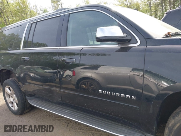 2015 Chevrolet Suburban LTZ with VIN 1GNSKKKC6FR637086, listed as a IAAI auction lot 42104826 with 79,986 mi miles and . Bid and sale history available at DreamBid. Image 13.