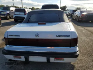 1990 Chrysler LeBaron z VIN 1C3XJ4533LG472070, wystawiony jako Copart lot #74314104 z przebiegiem 97 354 mil mil oraz Szkody całkowita. Historia ofert i sprzedaży dostępna na DreamBid. Obrazek 6.