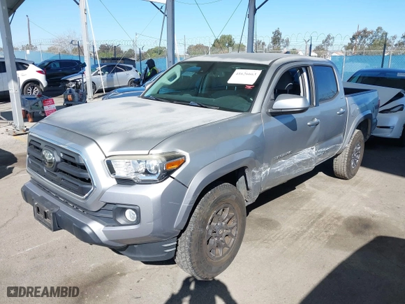 2018 Toyota Tacoma SR5 with VIN 3TMAZ5CN6JM056201, listed as a IAAI auction lot 41626663 with 55,599 mi miles. Bid and sale history available at carsss.com. Image 17.