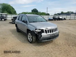 2016 Jeep Compass Sport z VIN 1C4NJCBA9GD810594, wystawiony jako Copart lot #56961885 z przebiegiem 151 386 mil mil oraz Szkoda całkowita • Salvage title. Historia ofert i sprzedaży dostępna na DreamBid. Obrazek 14.