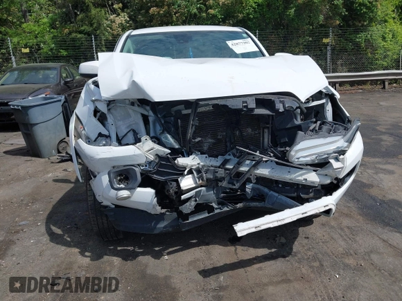 2021 Toyota Tacoma SR z VIN 5TFCZ5AN5MX265181, wystawiony jako IAAI lot #42077902 z przebiegiem 102 192 mil mil oraz . Historia ofert i sprzedaży dostępna na DreamBid. Obrazek 12.