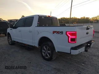 2018 Ford F-150 XL with VIN 1FTEW1EG4JKD64590, listed as a IAAI auction lot 41056678 with 115,792 mi miles. Bid and sale history available at carsss.com. Image 3.