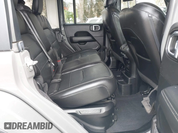 2021 Jeep Wrangler Unlimited Sahara with VIN 1C4JJXP64MW720263, listed as a IAAI auction lot 41514302 with 73,300 mi miles and . Bid and sale history available at DreamBid. Image 8.
