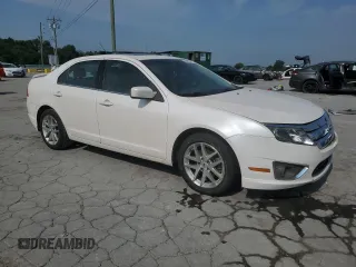 2012 Ford Fusion SEL with VIN 3FAHP0JG7CR428233, listed as a Copart auction lot 60446735 with 271,991 mi miles and Salvage title. Bid and sale history available at DreamBid. Image 4.