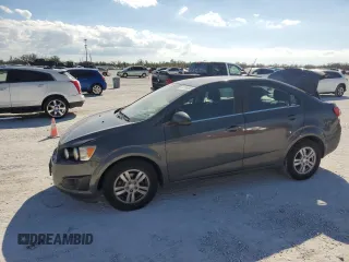 2013 Chevrolet Sonic LT with VIN 1G1JC5SHXD4198167, listed as a Copart auction lot 44758085 with 103,449 mi miles and Salvage Title. Bid and sale history available at DreamBid. Image 1.