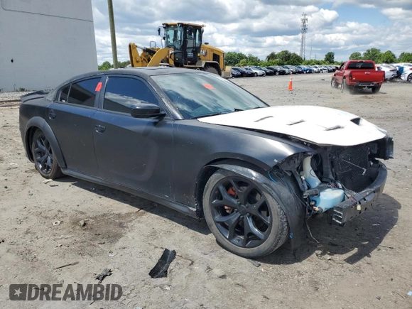 2015 Dodge Charger RT with VIN 2C3CDXCT9FH784672, listed as a Copart auction lot 58190615 with 121,033 mi miles and Salvage title. Bid and sale history available at DreamBid. Image 4.