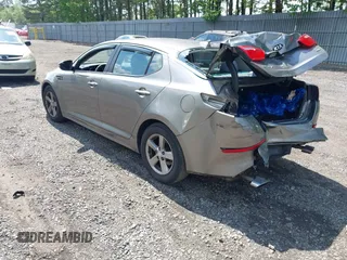 2015 Kia Optima LX z VIN 5XXGM4A73FG375345, wystawiony jako IAAI lot #42373557 z przebiegiem 180 029 mil mil oraz . Historia ofert i sprzedaży dostępna na DreamBid. Obrazek 3.