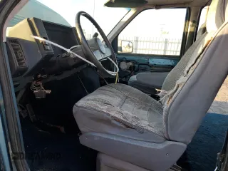 1986 GMC Safari z VIN 1GDDM15Z1GB521872, wystawiony jako Copart lot #87655995 z przebiegiem 30 889 mil mil oraz Szkody całkowita. Historia ofert i sprzedaży dostępna na DreamBid. Obrazek 7.