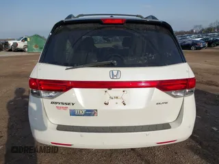 2014 Honda Odyssey Touring with VIN 5FNRL5H97EB037358, listed as a IAAI auction lot 41832825 with 208,894 mi miles and . Bid and sale history available at DreamBid. Image 16.