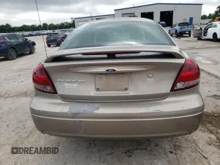 2005 Ford Taurus SE with VIN 1FAFP53205A252967, listed as a Copart auction lot 58449495 with Not provided miles and Salvage title. Bid and sale history available at DreamBid. Image 6.