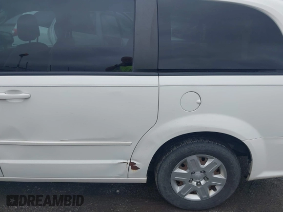 2012 Dodge Grand Caravan SE with VIN 2C4RDGBG8CR115003, listed as a IAAI auction lot 42217153 with 196,833 mi miles and . Bid and sale history available at DreamBid. Image 13.