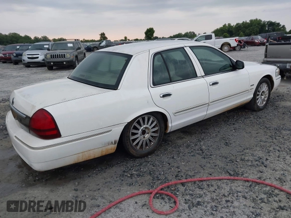 2010 Mercury Grand Marquis LS z VIN 2MEBM7FV5AX606873, wystawiony jako IAAI lot #42216310 z przebiegiem 198 896 mil mil oraz . Historia ofert i sprzedaży dostępna na DreamBid. Obrazek 4.