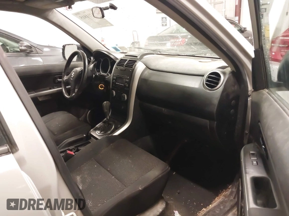 2012 Suzuki Grand Vitara Premium z VIN JS3TD0D62C4100440, wystawiony jako IAAI lot #41711815 z przebiegiem 171 527 mil mil oraz . Historia ofert i sprzedaży dostępna na DreamBid. Obrazek 5.