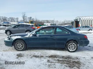 1999 Acura CL Premium z VIN 19UYA2250XL006640, wystawiony jako IAAI lot #41393749 z przebiegiem 77 308 mil mil oraz . Historia ofert i sprzedaży dostępna na DreamBid. Obrazek 14.