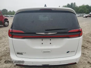 2023 Chrysler Pacifica Hybrid Limited with VIN 2C4RC1S70PR543587, listed as a Copart auction lot 60439795 with 11,558 mi miles and Salvage title. Bid and sale history available at DreamBid. Image 6.