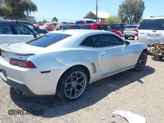 2014 Chevrolet Camaro LT z VIN 2G1FG1E30E9207699, wystawiony jako IAAI lot #42256519 z przebiegiem 107 219 mil mil oraz . Historia ofert i sprzedaży dostępna na DreamBid. Obrazek 4.