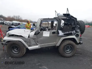 2001 Jeep Wrangler Sport with VIN 1J4FA49S41P355646, listed as a IAAI auction lot 41937746 with 160,634 mi miles. Bid and sale history available at carsss.com. Image 14.
