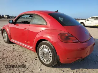 2014 Volkswagen Beetle 2.5L w/Sun with VIN 3VWJP7AT6EM624923, listed as a Copart auction lot 78641794 with 85,000 mi miles and Salvage Title. Bid and sale history available at DreamBid. Image 2.