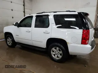 2011 GMC Yukon SLT with VIN 1GKS2CE00BR358215, listed as a Copart auction lot 70493084 with 219,118 mi miles and Clean Title. Bid and sale history available at carsss.com. Image 2.