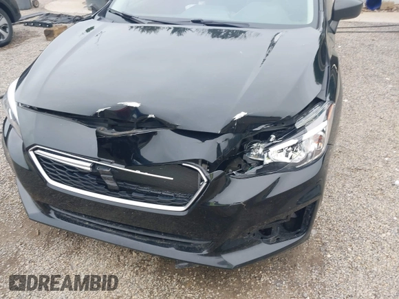 2019 Subaru Impreza with VIN 4S3GTAA62K3743520, listed as a IAAI auction lot 42485321 with 75,736 mi miles and . Bid and sale history available at DreamBid. Image 6.