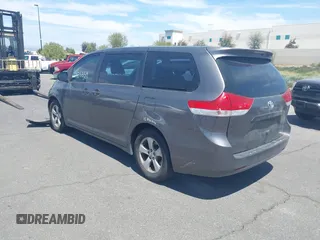 2012 Toyota Sienna with VIN 5TDZK3DC9CS261944, listed as a IAAI auction lot 41885359 with 184,918 mi miles. Bid and sale history available at carsss.com. Image 3.