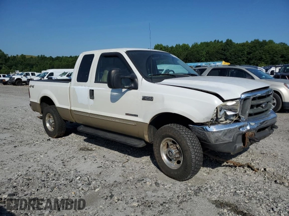 2000 Ford F-250 XL with VIN 1FTNX21F3YEB32295, listed as a Copart auction lot 60867745 with 329,194 mi miles and Salvage title. Bid and sale history available at DreamBid. Image 4.