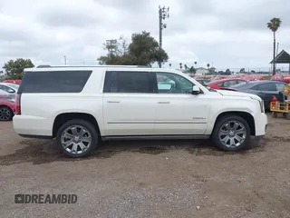 2015 GMC Yukon XL Denali with VIN 1GKS2JKJ7FR641430, listed as a IAAI auction lot 42163969 with 129,085 mi miles. Bid and sale history available at carsss.com. Image 13.