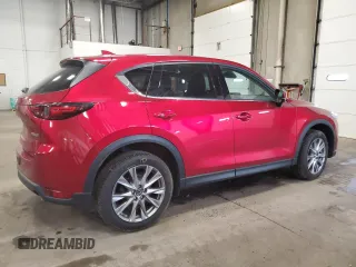 2020 Mazda CX-5 Grand Touring with VIN JM3KFBDM9L0760861, listed as a Copart auction lot 60977275 with 58,608 mi miles and Salvage title. Bid and sale history available at DreamBid. Image 3.