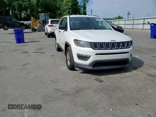 2018 Jeep Compass Sport with VIN 3C4NJCAB7JT140622, listed as a Copart auction lot 58162185 with 128,686 mi miles and Salvage title. Bid and sale history available at DreamBid. Image 14.