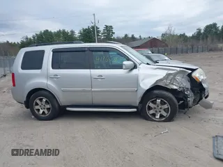 2011 Honda Pilot Touring with VIN 5FNYF4H90BB022354, listed as a IAAI auction lot 41965082 with 126,505 mi miles and . Bid and sale history available at carsss.com. Image 14.