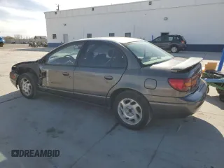 2000 Saturn SL with VIN 1G8ZK5276YZ227493, listed as a Copart auction lot 48172835 with 105,806 mi miles and Salvage title. Bid and sale history available at DreamBid. Image 2.