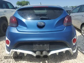 2016 Hyundai Veloster Turbo z VIN KMHTC6AEXGU261247, wystawiony jako Copart lot #52240215 z przebiegiem 137 238 mil mil oraz Czysty tytuł • Clean title. Historia ofert i sprzedaży dostępna na DreamBid. Obrazek 6.