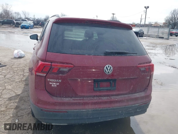 2018 Volkswagen Tiguan S with VIN 3VV1B7AX9JM085312, listed as a IAAI auction lot 41656827 with 122,322 mi miles and . Bid and sale history available at DreamBid. Image 16.