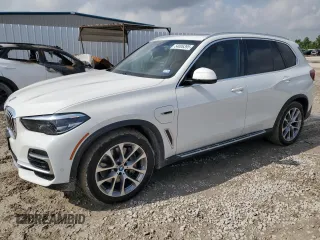 2023 BMW X5 xDrive45e with VIN 5UXTA6C02P9P87045, listed as a Copart auction lot 54006395 with 45,143 mi miles and Salvage title. Bid and sale history available at DreamBid. Image 1.