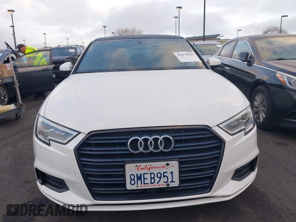 2019 Audi A3 Premium with VIN WAUAUGFF3KA101038, listed as a IAAI auction lot 41878582 with 61,726 mi miles and . Bid and sale history available at DreamBid. Image 12.