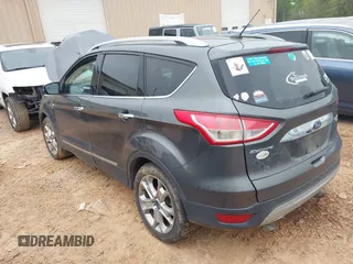 2015 Ford Escape Titanium with VIN 1FMCU9J90FUC14650, listed as a IAAI auction lot 41992858 with 158,963 mi miles and . Bid and sale history available at DreamBid. Image 3.