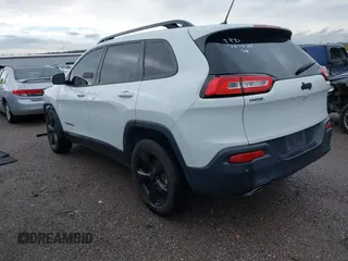 2016 Jeep Cherokee Latitude with VIN 1C4PJMCSXGW214243, listed as a IAAI auction lot 40850362 with 96,240 mi miles and . Bid and sale history available at carsss.com. Image 3.
