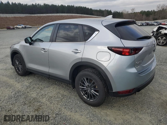 2021 Mazda CX-5 Touring with VIN JM3KFACM2M0451083, listed as a Copart auction lot 49999935 with 59,927 mi miles and Salvage Title. Bid and sale history available at carsss.com. Image 2.