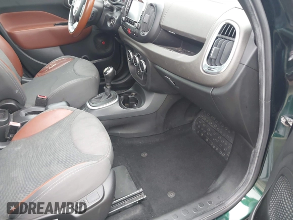 2014 FIAT 500L Trekking with VIN ZFBCFADH0EZ007506, listed as a IAAI auction lot 42563872 with 126,535 mi miles and . Bid and sale history available at DreamBid. Image 5.