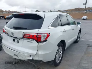 2018 Acura RDX with VIN 5J8TB3H31JL012439, listed as a IAAI auction lot 41565530 with 63,909 mi miles and . Bid and sale history available at DreamBid. Image 4.