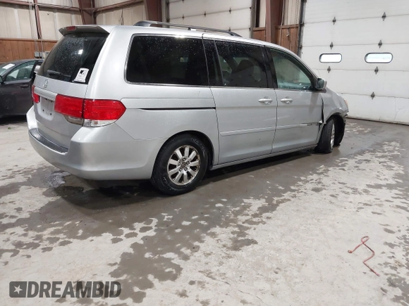 2010 Honda Odyssey EX z VIN 5FNRL3H44AB085662, wystawiony jako IAAI lot #42199416 z przebiegiem 181 221 mil mil oraz . Historia ofert i sprzedaży dostępna na DreamBid. Obrazek 4.